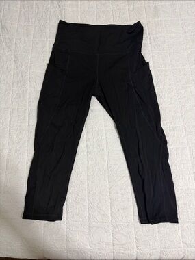 High-Waist Black Capri Leggings with Side Pockets